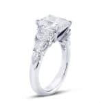 7 stone ring with radiant cut and half moond cut diamond side stones