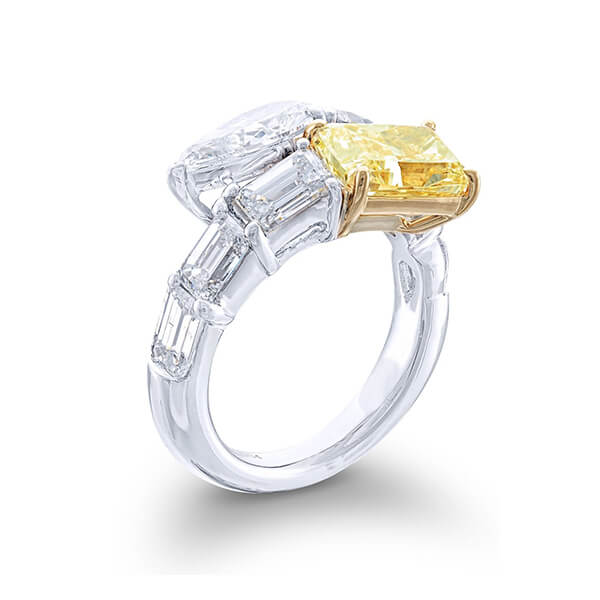 toi et moi ring with fancy yellow radiant and pear shaped