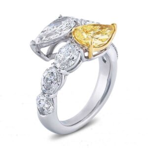 two stone pear cut diamond ring with fancy yellow pear and oval cut side stones